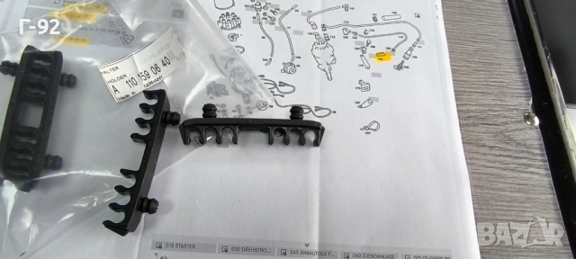 A1101590640**NEU**MERCEDES-BENZ**ДЪРЖАЧ ЗА КАБЕЛИТЕ НА ЗАПАЛВАНЕТО**