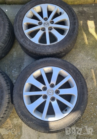 Оригинални лети джанти за Mazda 16 цола 5х114.3 с летни гуми Continental, снимка 3 - Гуми и джанти - 53669167