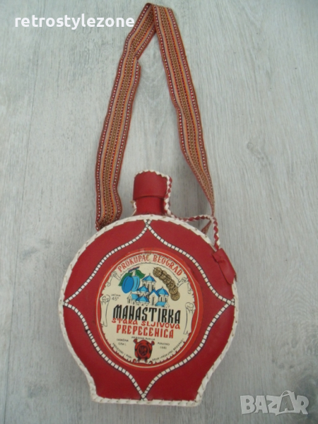 № 7422 стара стъклена бъклица   - с кожено покритие / изк.кожа /  , снимка 1