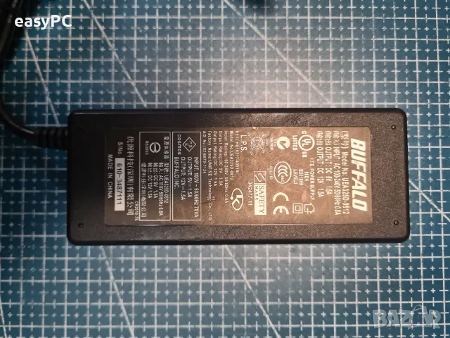 Оригинален захранващ адаптер BUFFALO UAE325D-0512 12V 5V, снимка 2 - Друга електроника - 47837350