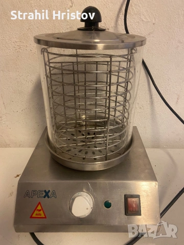 Уред за Ход дог и за затопляне и подръжка на топли храни