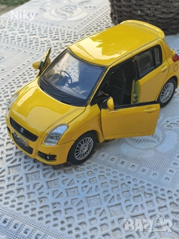 Suzuki Swift 1/38 , снимка 2 - Колекции - 51618521