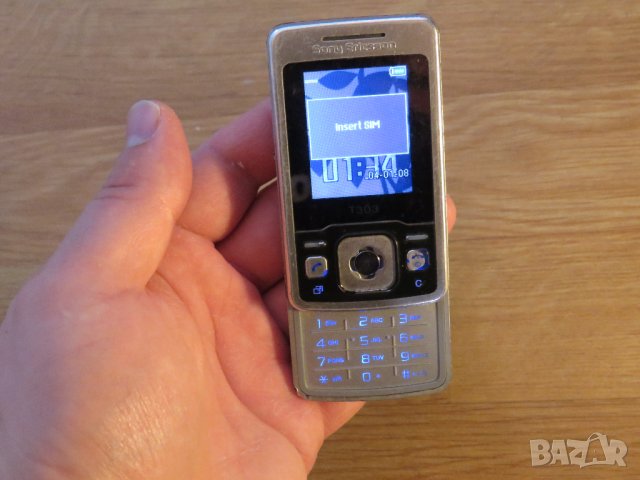 плъзгащ телефон, телефон слайд с копчета sony ericsson T303, сони ериксон Т303 - 2008г. - работещ.