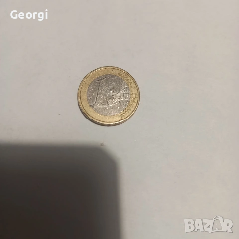 1 евро монета 2002 г. с рядка фабрична грешка при сеченето допълнителен метал под единицата, снимка 2 - Нумизматика и бонистика - 53310693