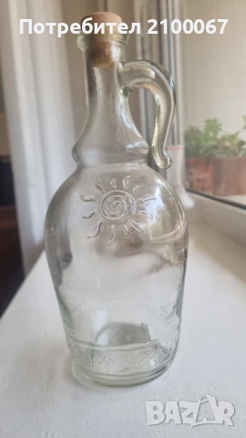 7 броя еднолитрови бутилки от ракия с тапи.