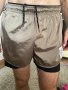 Къси панталони SATISFY, снимка 1 - Спортна екипировка - 41850136