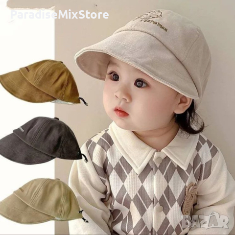 Удобна детска шапка с козирка от мека материя. Обиколката на шапката е 48см Налична в 4 цвята, снимка 1 - Шапки, шалове и ръкавици - 44622554