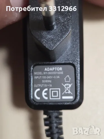Универсален адаптер / зарядно 5V 1A (5W) – Модел WY-0600501000E , снимка 2 - Кабели и адаптери - 55966756