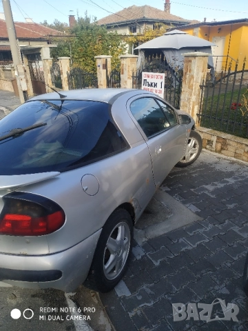 Опел Тигра 1.4 1999г, снимка 5 - Автомобили и джипове - 52172101