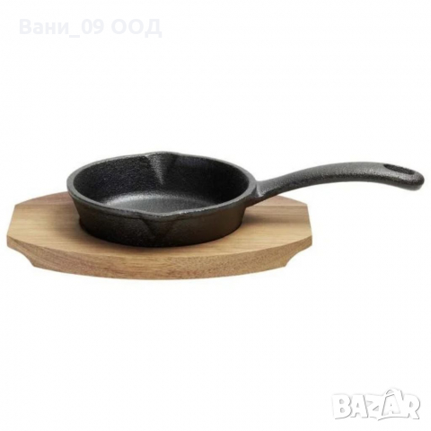 Чугунен тиган с акациева поставка