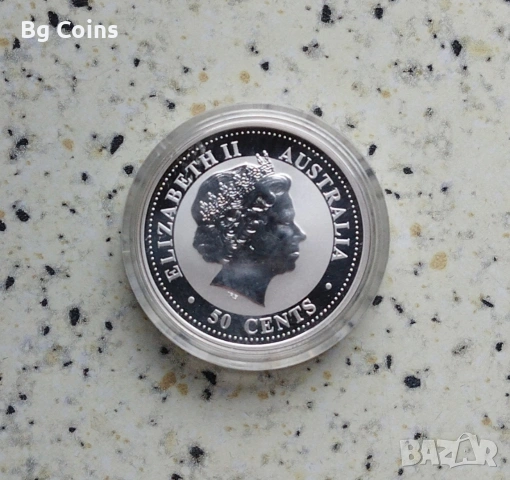 Сребро 1/2 OZ 2006 Куче , снимка 2 - Нумизматика и бонистика - 53053437