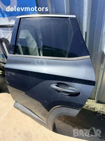 77004N7005 задна лява врата сива от Hyundai Tucson 1.6 T-GDi Hybrid. Цената е за необорудвана врата