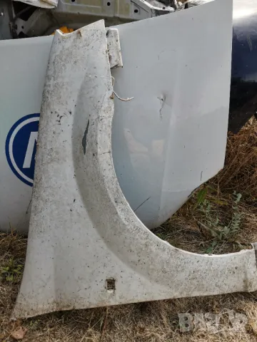 Преден десен калник за Дачия Логан 1 , снимка 12 - Части - 47476716