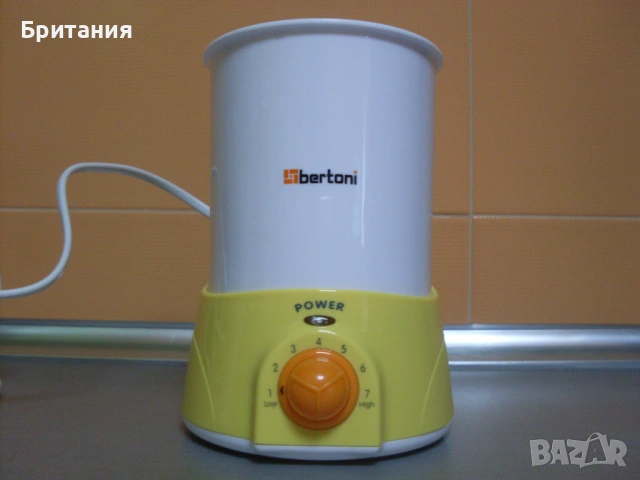 Уред за затопляне на бебешка храна.