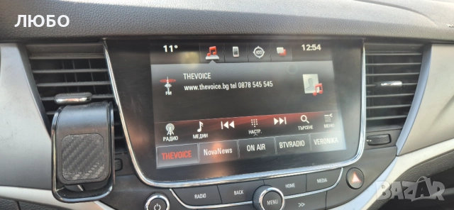 Opel Astra Sports Tourer, снимка 11 - Автомобили и джипове - 52752194