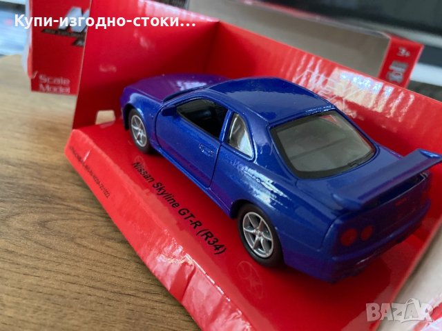Умален метален моден - Welly Nex Nissas Skyline GT-R (R34), снимка 5 - Играчки за стая - 42018157