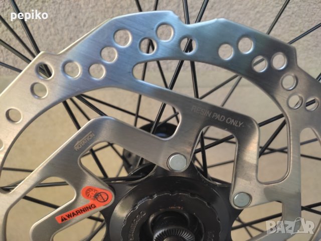 Продавам колела внос от Германия  алуминиева предна капла с диск SHIMANO SM-RT10-M 28 цола, снимка 8 - Части за велосипеди - 41808938
