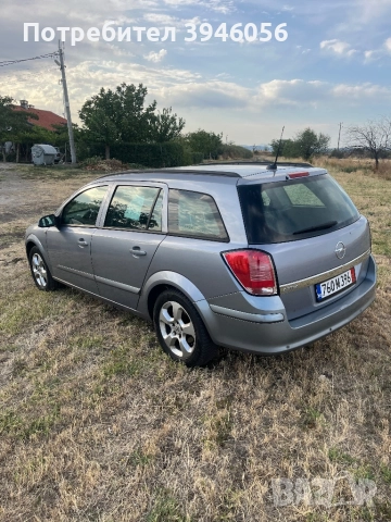 Опел Астра 1,9 6ск Навигация , снимка 4 - Автомобили и джипове - 52887975