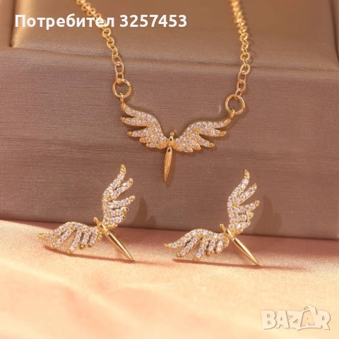 ✨ Angel Wings Spark – нежен комплект от колие и обеци с ангелски криле, обсипани с бели кристали. 