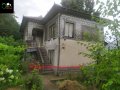 Двуетажна къща с двор в село Иванча, снимка 1 - Къщи - 41381175