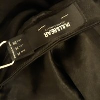 Черна къса секси пола сатен, чисто нова с нейно коланче, с цип, снимка 2 - Поли - 39217840
