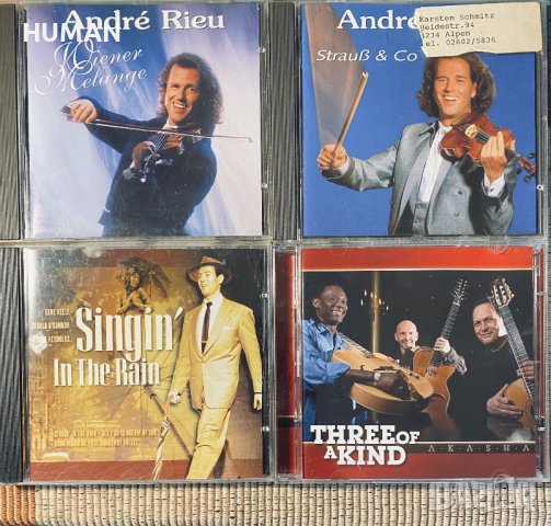 Andre Rieu,Singing In The Rain,Three Of A Kind , снимка 1 - CD дискове - 41291115