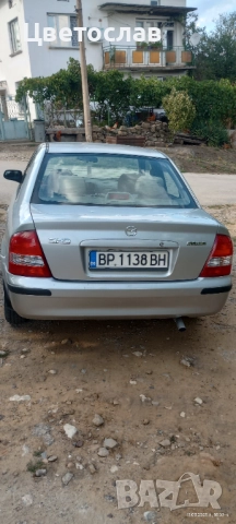 Mazda 323, снимка 2 - Автомобили и джипове - 51702467