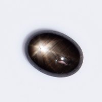 Черен звезден сапфир 1.23ct 6-лъчева звезда овален кабошон, снимка 1 - Други - 41635699