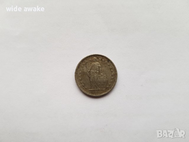 Монета 1/2 швейцарски франк