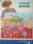 Unicef Puzzle: Festival in Orange, снимка 1