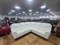 Светло кремав кожен ъглов диван с ел. релакс механизъм, снимка 1 - Дивани и мека мебел - 39945088