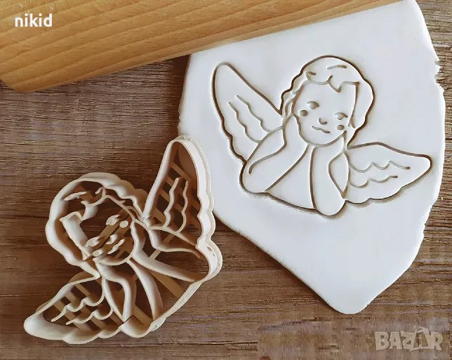 Ангел подпрян на ръце пластмасов резец форма фондан тесто бисквитки, снимка 1