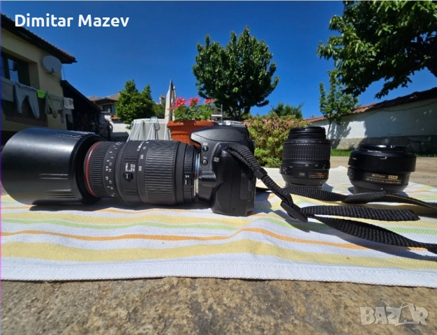 Фотоапарат Nikon d3000 c три обектива отлично състояние, снимка 3 - Фотоапарати - 52482891