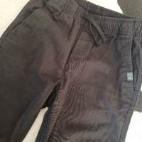 Черен панталон за момче HM , снимка 1 - Детски панталони и дънки - 44750837