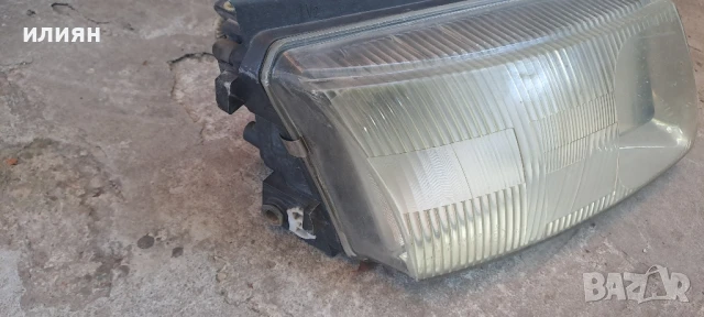 десен фар за vw Passat 4 1998 1999 2000 Hella, снимка 2 - Части - 51348263