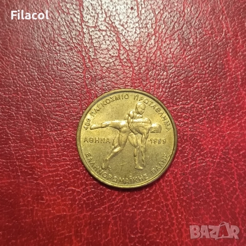 Гърция 100 драхми 1999 45 Световно първенство по борба, снимка 2 - Нумизматика и бонистика - 51555079