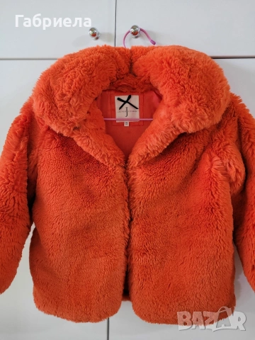 Детско оранжево пухено палтенце 8-9 години