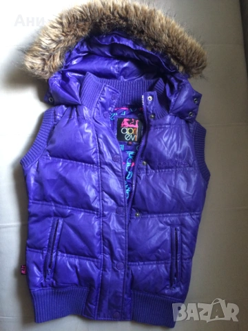 Дебел лилав елек за сезона.