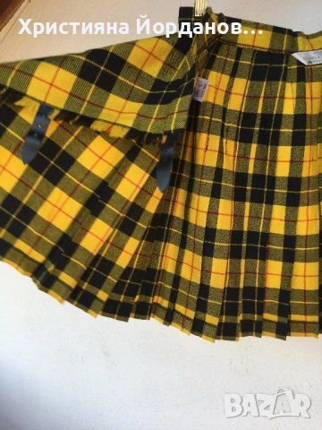 Мини плисирана вълнена пола на Marks and Spencer., снимка 13 - Поли - 52266416