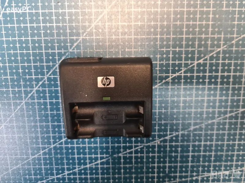 Оригинален зарядно за батерии HP PhotoSmart AA NiMH Battery Charger L2420-67901 , снимка 1