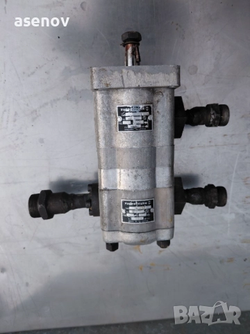 двусекционна хидравлична помпа