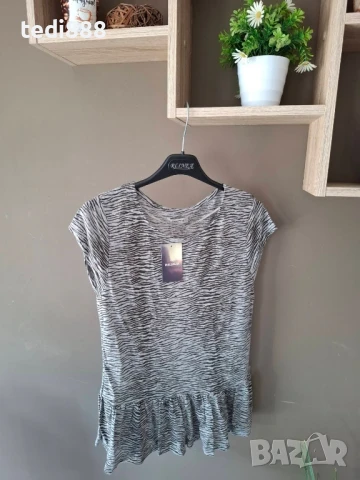 нова блузка