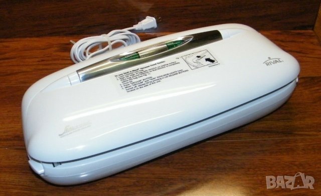 Машuна за ваkуумuране Rival