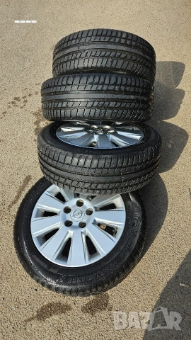Алуминиеви джанти Opel + гуми Riken 205/55/16 94W XL DOT21, снимка 2 - Гуми и джанти - 53706777