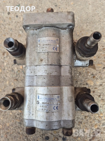 Двусекционна хидравлична помпа .