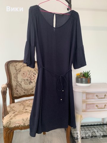 Рокля в размер 42, отговаря на L