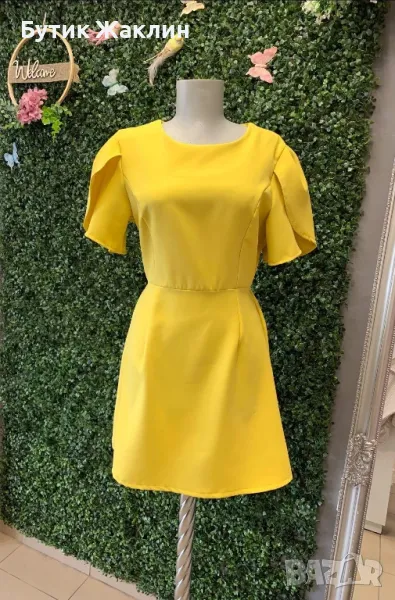 Кокетна жълта рокля с ефектен гръб и панделка, снимка 1
