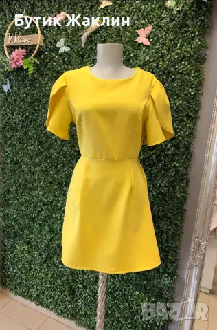 Кокетна жълта рокля с ефектен гръб и панделка, снимка 1
