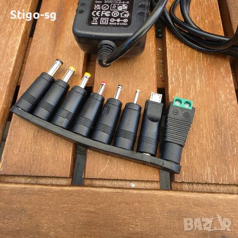 Универсален захранващ адаптер AC/DC 24V 1A (24W) + комплект сменяеми накрайници (НОВ, снимка 2 - Кабели и адаптери - 55979205