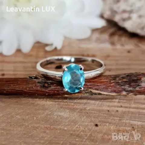 5724
Сребърен пръстен със син Топаз, снимка 1